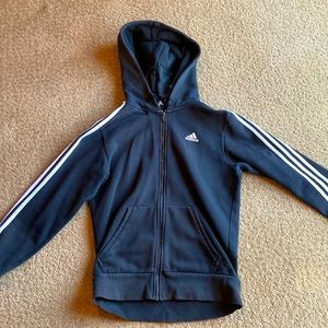 All black Adidas jacket with the classic three white stripes down both arms